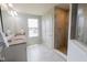 Bright bathroom with double sink vanity, granite countertop, and tiled walk-in shower at 4863 Sherlock Dr, Westfield, IN 46062
