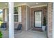 Charming front porch with seating and a beautifully landscaped entrance, offering a warm welcome at 4863 Sherlock Dr, Westfield, IN 46062
