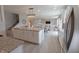 Open concept kitchen with granite counters, island, stainless steel appliances, and seamless flow to living spaces at 4863 Sherlock Dr, Westfield, IN 46062