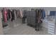Well-organized walk-in closet with clothes, storage drawers, and a vanity area, maximizing space and functionality at 4863 Sherlock Dr, Westfield, IN 46062