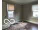 Sunlit bedroom with natural light streaming through the windows, creating a cozy and inviting space at 4943 S State Ave, Indianapolis, IN 46227