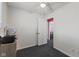 Bright bedroom featuring neutral walls, a closet, and access to other rooms at 5115 Bertha St, Indianapolis, IN 46241