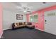 Inviting living room featuring a comfortable sectional sofa, and bright walls at 5115 Bertha St, Indianapolis, IN 46241