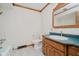 Bathroom featuring a vanity, toilet, and shower/tub combination at 530 Westmore Dr, Indianapolis, IN 46214