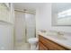 Bathroom featuring a shower, toilet, and vanity with storage at 530 Westmore Dr, Indianapolis, IN 46214