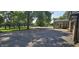 The backyard features a basketball court and a sunroom extension, perfect for relaxation or play at 5433 Brendonridge Rd, Indianapolis, IN 46226