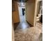 Basement hallway leading to a bathroom and laundry area at 5433 Brendonridge Rd, Indianapolis, IN 46226
