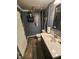 Basement bathroom features a toilet, sink, mirror, and decor at 5433 Brendonridge Rd, Indianapolis, IN 46226