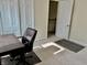 Bedroom features neutral walls, closet, carpet flooring and an adjacent hallway at 5433 Brendonridge Rd, Indianapolis, IN 46226