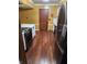 Galley kitchen featuring modern stainless steel appliances and ample cabinet space at 5433 Brendonridge Rd, Indianapolis, IN 46226