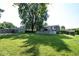 Large backyard featuring above-ground pool, shed, and fenced in yard at 5522 Closser Ct, Indianapolis, IN 46221