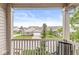 Inviting balcony overlooking a well-maintained neighborhood with lush greenery, offering a peaceful retreat at 5619 Payne Blvd, Plainfield, IN 46168