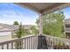 Relaxing balcony with a chair, offering a serene outdoor space with a view of the neighborhood at 5619 Payne Blvd, Plainfield, IN 46168