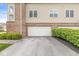 Attached garage with a white door, providing convenient parking and extra storage space at 5619 Payne Blvd, Plainfield, IN 46168