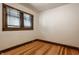 This bright bedroom features natural light and hardwood floors at 5622 Guilford Ave, Indianapolis, IN 46220