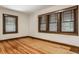 This bright bedroom features natural light and hardwood floors at 5622 Guilford Ave, Indianapolis, IN 46220