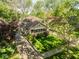 Aerial view of a charming home showcasing lush landscaping and inviting curb appeal at 5622 Guilford Ave, Indianapolis, IN 46220