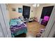 Cozy bedroom with hardwood floors, black-out curtains and plenty of natural light at 5805 S Gale St, Indianapolis, IN 46227