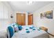 Comfortable bedroom featuring a closet, doorway, carpet, and a large window at 6034 Doverton Dr, Noblesville, IN 46062