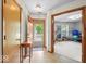 Bright entryway leads to an exercise room, showcasing open space and natural light at 6034 Doverton Dr, Noblesville, IN 46062