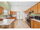 Functional kitchen with ample counter space, stainless steel appliances, and white cabinets at 6034 Doverton Dr, Noblesville, IN 46062