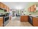 Open kitchen layout with eat-in dining and stainless steel appliances at 6034 Doverton Dr, Noblesville, IN 46062