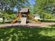 Community playground featuring slides, climbing wall, and ample space for outdoor activities at 6034 Doverton Dr, Noblesville, IN 46062