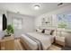 Inviting bedroom featuring a comfortable bed, stylish furnishings, and natural light at 611 Hampton Ln, Anderson, IN 46017