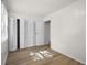 This bedroom has folding doors and a view to the outside at 611 Hampton Ln, Anderson, IN 46017