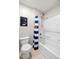 Clean bathroom with toilet, shower/tub combination with fun shower curtain, and neutral color scheme at 7559 Pipestone Dr, Indianapolis, IN 46217