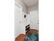 Practical entryway with a shoe rack bench and coat hooks offering organized storage for shoes and accessories at 7559 Pipestone Dr, Indianapolis, IN 46217