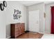 Cozy foyer with hardwood floors, decorative accents, and a welcoming atmosphere at 7559 Pipestone Dr, Indianapolis, IN 46217