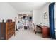 Bright hobby room featuring natural light, carpet, and storage for creative projects at 7559 Pipestone Dr, Indianapolis, IN 46217