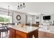 Open floor plan showcases kitchen island, dining, and living area at 7559 Pipestone Dr, Indianapolis, IN 46217