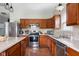Modern kitchen featuring stainless steel appliances, plenty of cabinet space, and great light at 7559 Pipestone Dr, Indianapolis, IN 46217