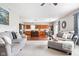 Open-concept layout with a spacious living room flowing into the kitchen and dining area at 7559 Pipestone Dr, Indianapolis, IN 46217