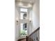 Bright hallway features large windows offering natural light and views of the home exterior at 7601 W Stonegate Dr, Zionsville, IN 46077