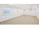 Finished basement with carpet flooring, natural light and ample space at 764 Bloor Woods Ct, Zionsville, IN 46077