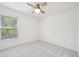 Bright bedroom features plush carpeting and a window with natural light at 764 Bloor Woods Ct, Zionsville, IN 46077