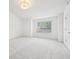Bright, spacious bedroom with large window and plush carpeting at 764 Bloor Woods Ct, Zionsville, IN 46077