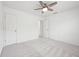 Bedroom with ceiling fan, neutral carpet, and two doors at 764 Bloor Woods Ct, Zionsville, IN 46077
