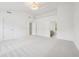 Open bedroom with multiple doorways and bright natural light at 764 Bloor Woods Ct, Zionsville, IN 46077