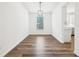Dining room featuring hardwood floors and pendant lighting fixture at 764 Bloor Woods Ct, Zionsville, IN 46077