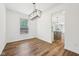 Dining room area featuring hardwood floors and natural lighting at 764 Bloor Woods Ct, Zionsville, IN 46077
