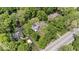 Aerial view of home with extensive landscaping and neighboring homes at 8100 N Meridian St, Indianapolis, IN 46260