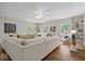Cozy living room featuring a sectional sofa, hardwood floors and built in bookshelves at 8100 N Meridian St, Indianapolis, IN 46260