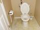 Cozy bathroom features white toilet and a convenient toilet paper holder at 8160 Whitham Dr, Indianapolis, IN 46237