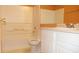 Bathroom with tub and shower, sleek vanity, and updated sink and faucet fixtures at 8160 Whitham Dr, Indianapolis, IN 46237