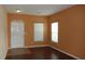 Bright living room with hardwood floors, white trim and neutral paint at 8160 Whitham Dr, Indianapolis, IN 46237