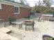 Relaxing patio with a firepit and chairs for outdoor gatherings at 833 N 700 W, Greenfield, IN 46140